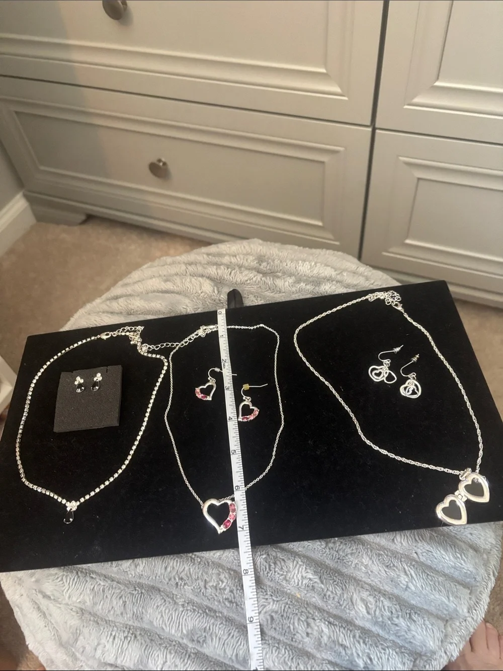 3 silvertone  Pendant Necklaces matching earrings.